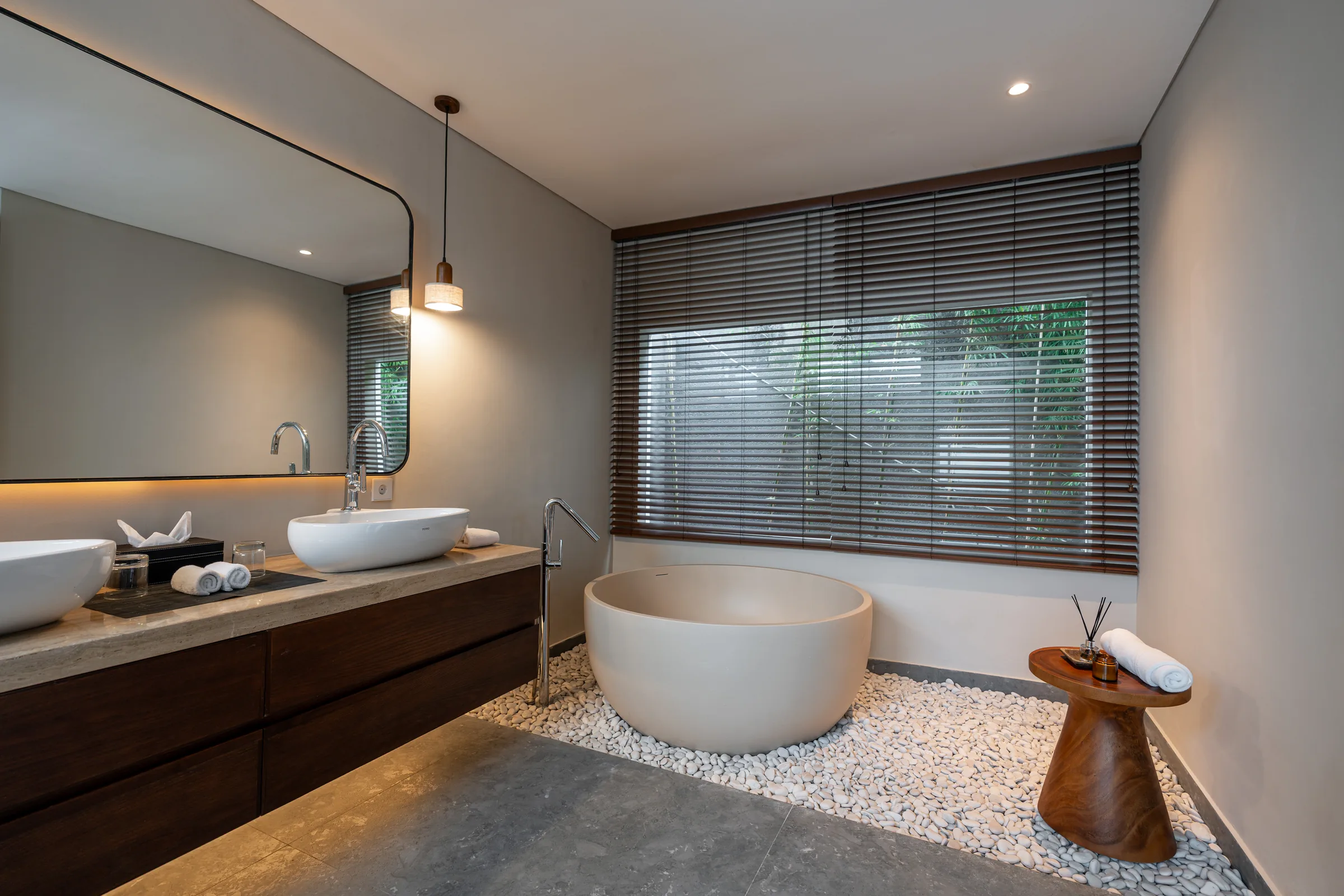 Private villa bathroom with freestanding bathtub