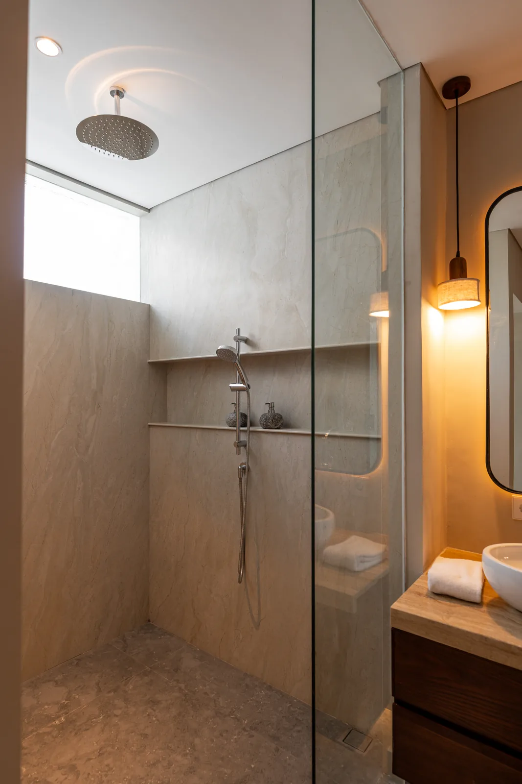 Walk-in rain shower inside the villa bathroom