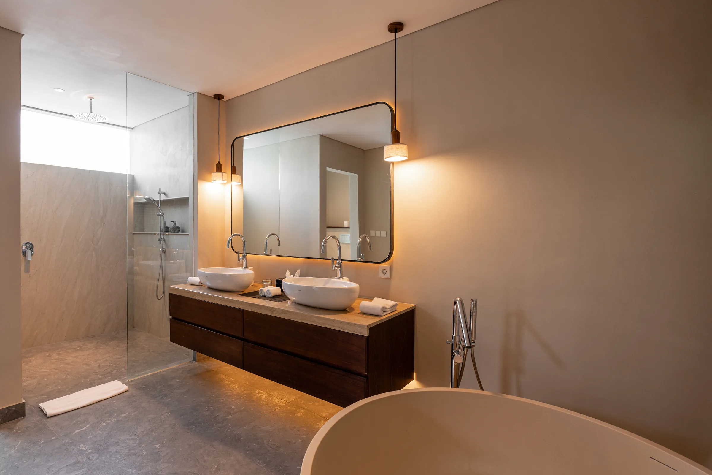Double vanity and walk-in shower in the two-bedroom villa bathroom