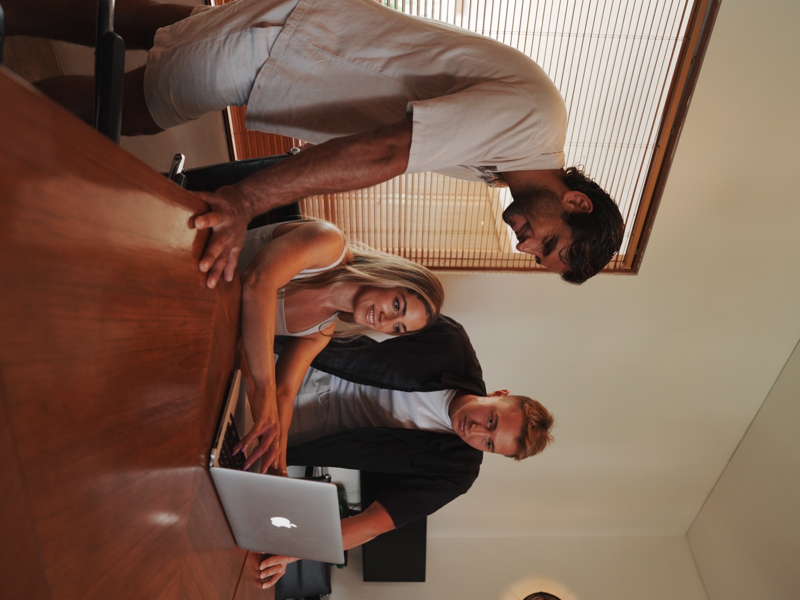 A member of the Pronoia team going through a guest's plan with them
